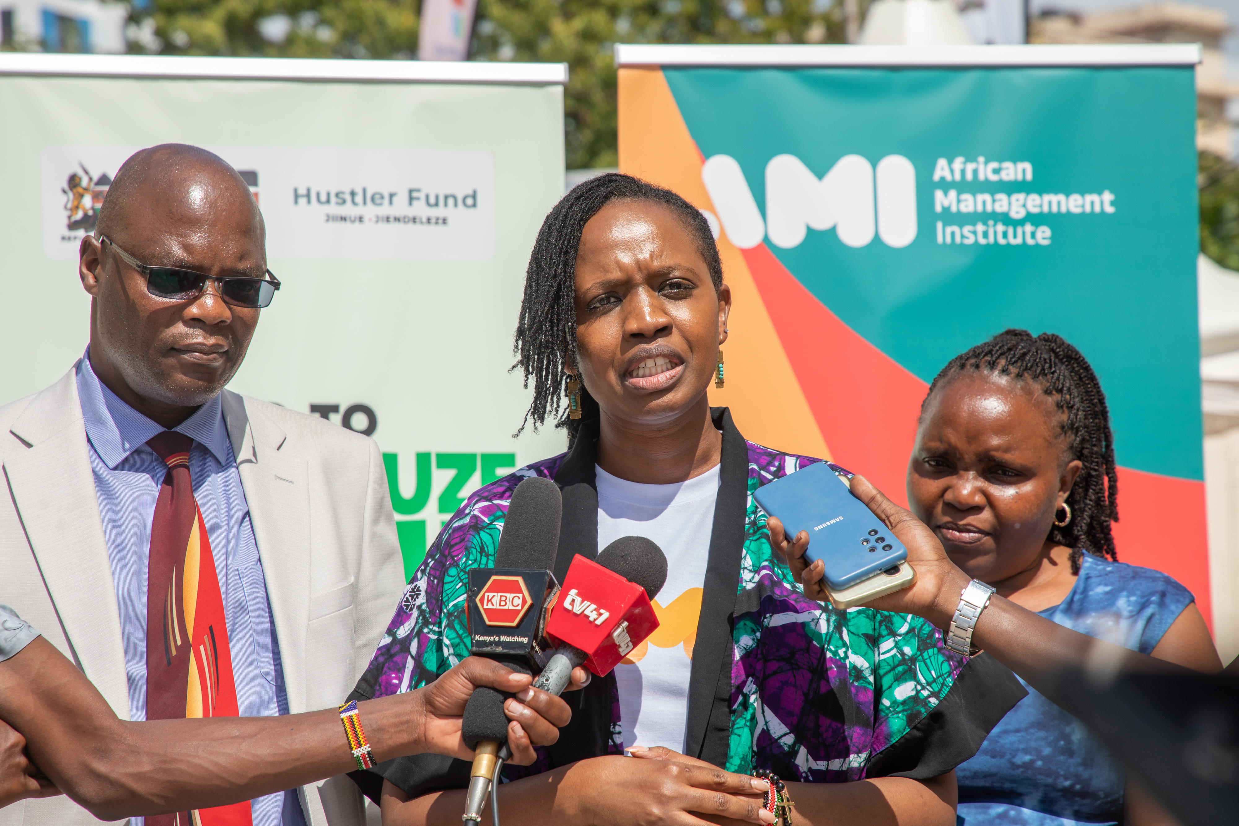 Cavin(Strathmore), Mercy(AMI) and Millicent(SDMSMEs) addressing the press