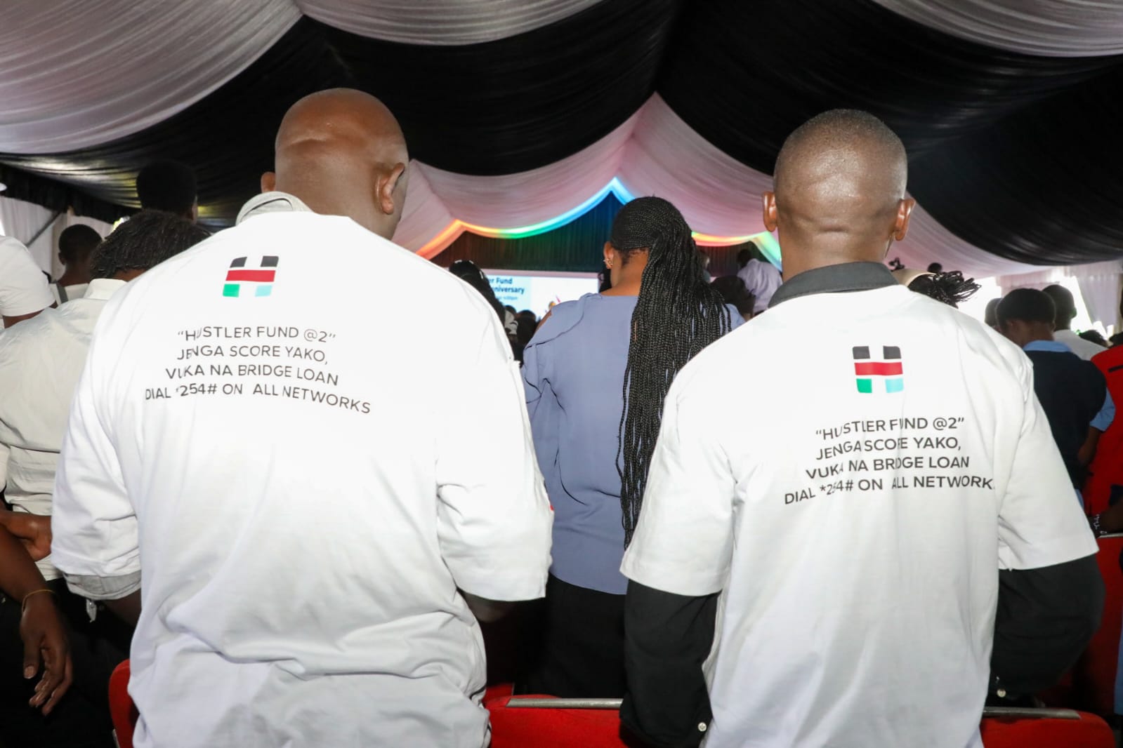 Borrowers on tshirts displaying the new product (Bridge Loan).